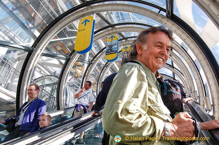 Tony going up the escalator